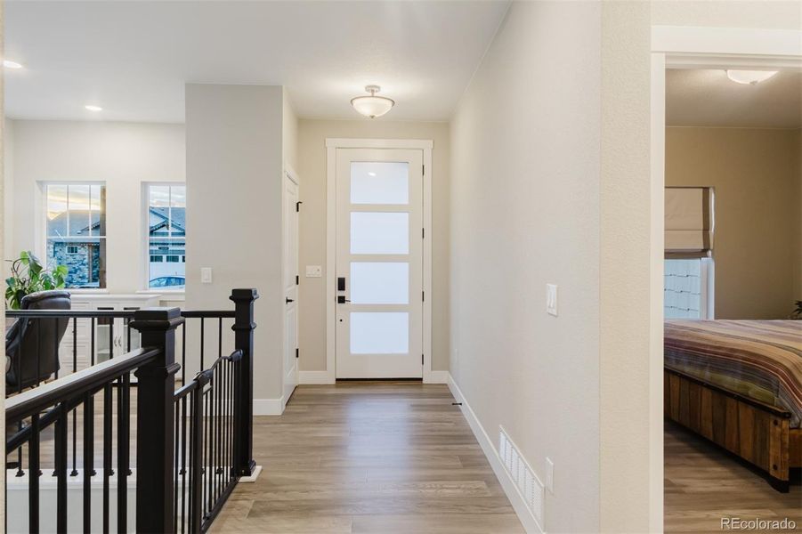 Welcome home! The entry of the home is well lit thanks to the glass inserts in the front door and the front windows in the office nook at the front of the home. Welcome home! The entry of the home is well lit thanks to the glass inserts in the front door and the front windows in the office nook at the front of the home.