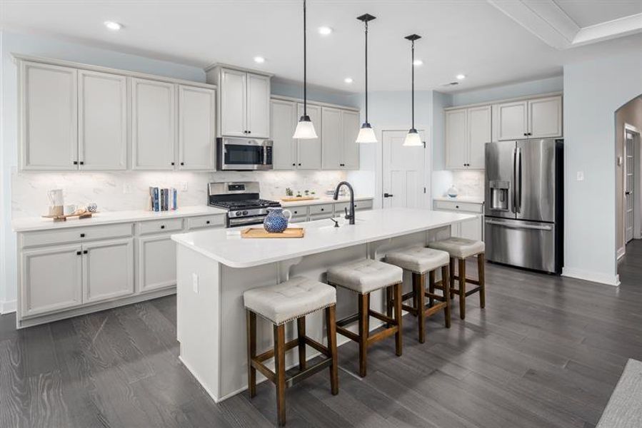 Representative furnished interior of a home built from the Esquire Place by Ryan Homes in Crystal Falls Estates, Dawsonville (Image 5).