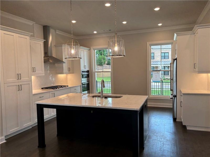 Furnished interior view inside a new home in Brackley Single Family, Cumming (Image 16).