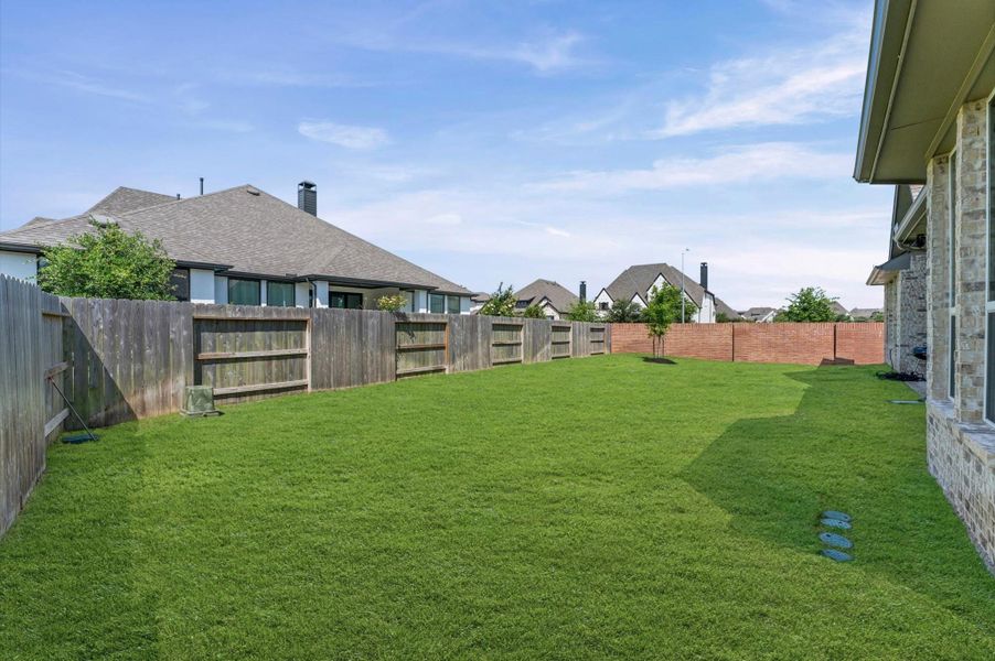 Exterior details and patio area of a home in , Fulshear (Image 24).