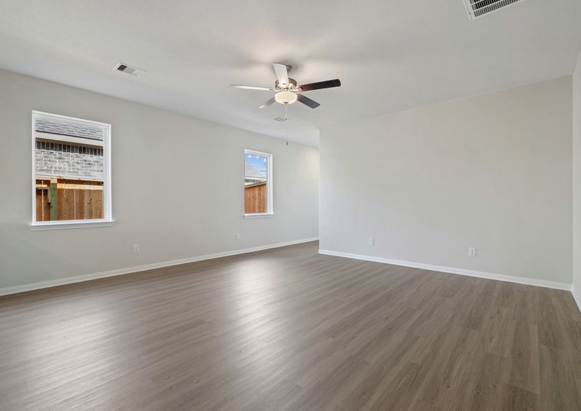 Family room with beautiful dark wood vinyl flooring Family room with beautiful dark wood vinyl flooring