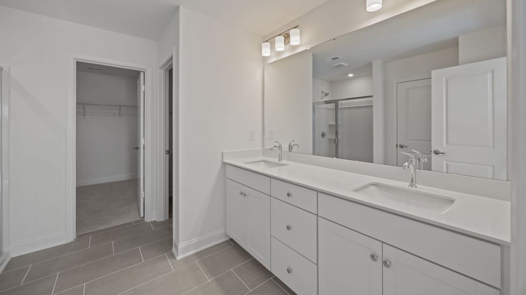 The Burton Plan in Farms at Bellingham by DRB Homes in Charlotte NC - Primary Bathroom