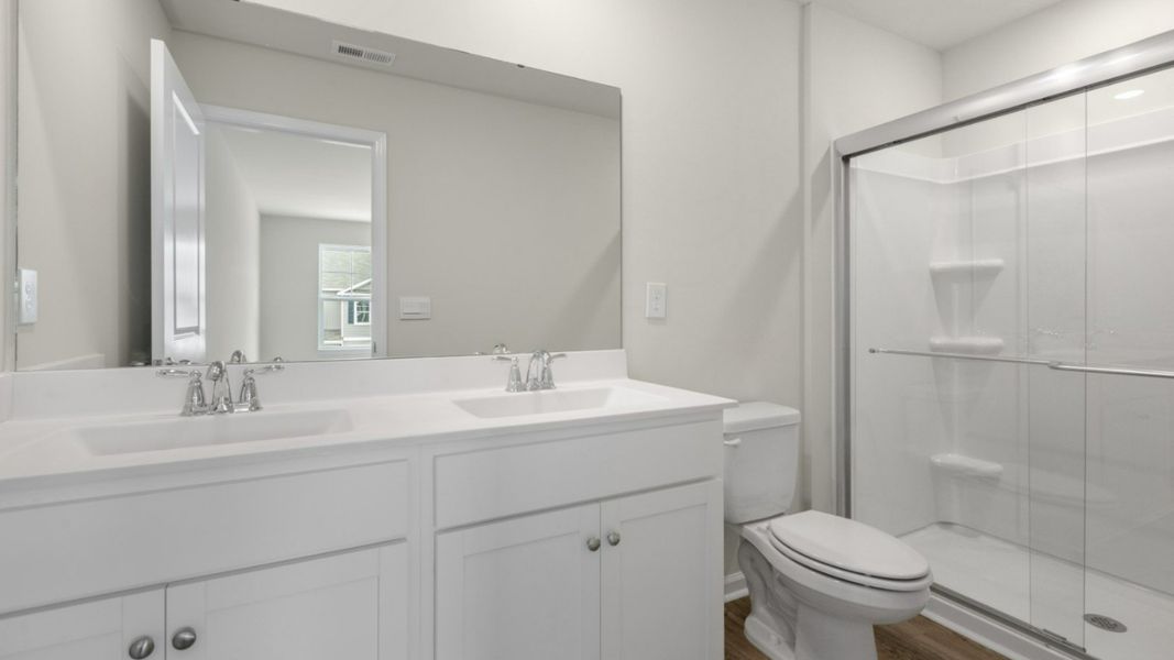 Representative furnished interior of a home built from the PEARSON TOWNHOME by D.R. Horton in Grayson Park Townhomes, Leland (Image 17).
