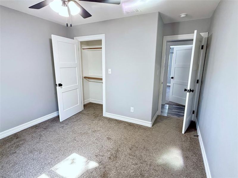 Bedroom 3 featuring a closet and a ceiling fan Bedroom 3 featuring a closet and a ceiling fan