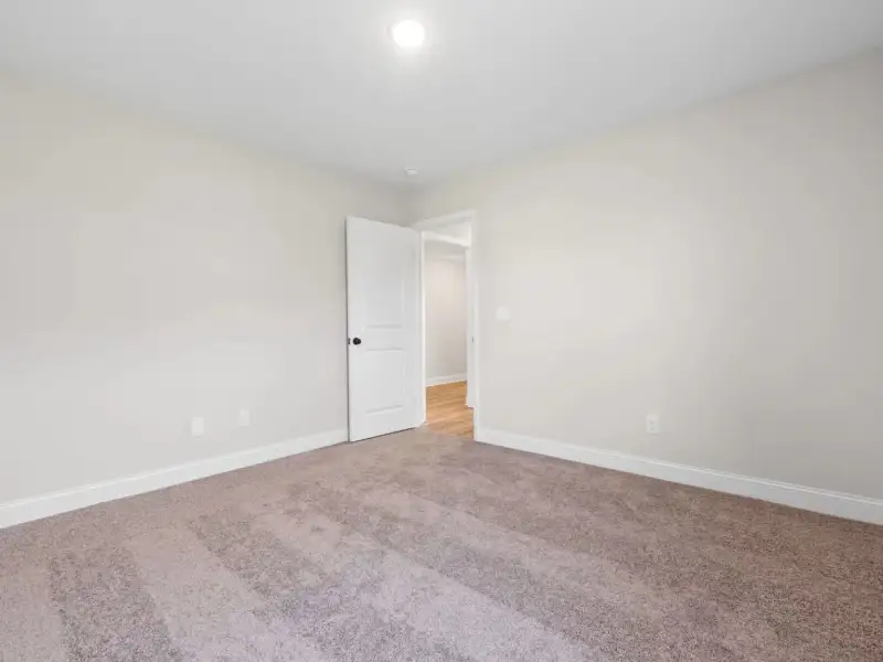 Spacious, unfurnished interior of a new home in Waverly Estates, Josephine (Image 26). Spacious, unfurnished interior of a new home in Waverly Estates, Josephine (Image 26).