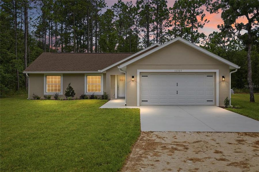 Front exterior of a new home in , Brooksville, FL, highlighting curb appeal (Image 27). Front exterior of a new home in , Brooksville, FL, highlighting curb appeal (Image 27).