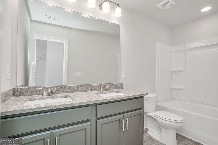 Furnished interior view inside a new home in Harley Farms South, Bonaire (Image 9).