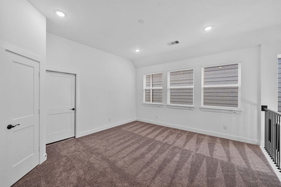 Spacious, unfurnished interior of a new home in Meridiana, Manvel (Image 22).