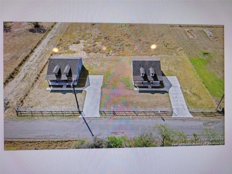 Aerial view of property and surrounding area