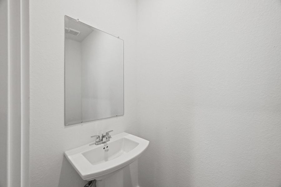 Furnished interior view inside a new home in Bridges on Lake Houston Villas, Humble (Image 7).