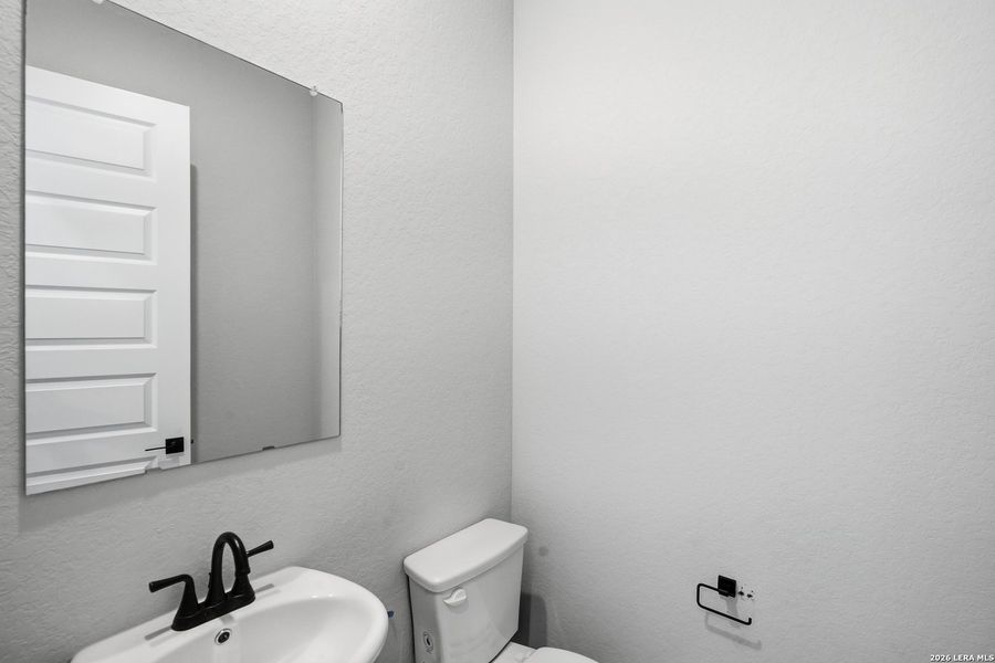 Furnished interior view inside a new home in Potranco Oaks, Castroville (Image 9).