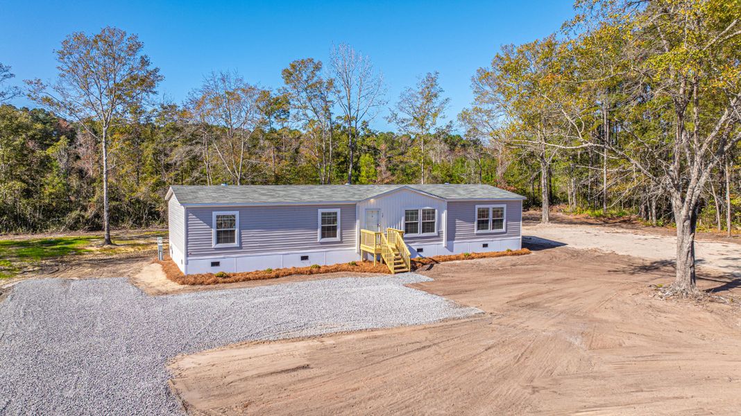 Exterior details and patio area of a home in , Pinopolis (Image 25).