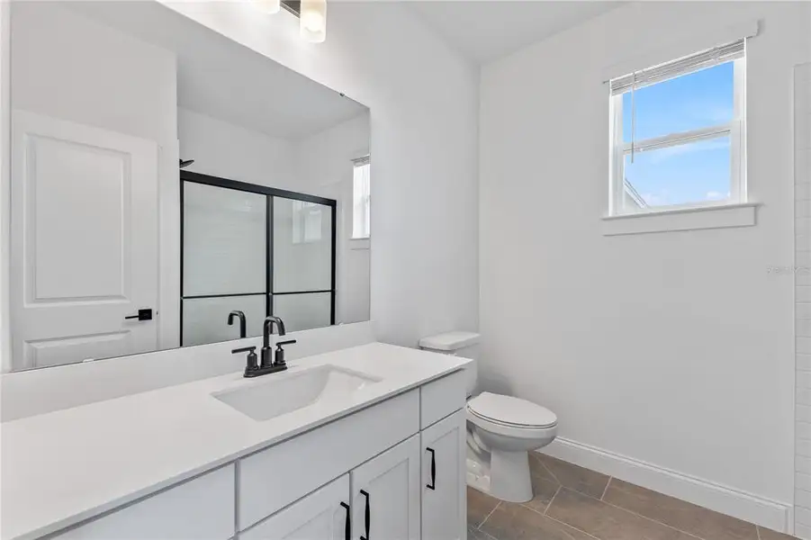 Furnished interior view inside a new home in Osprey Ranch, Winter Garden (Image 16).