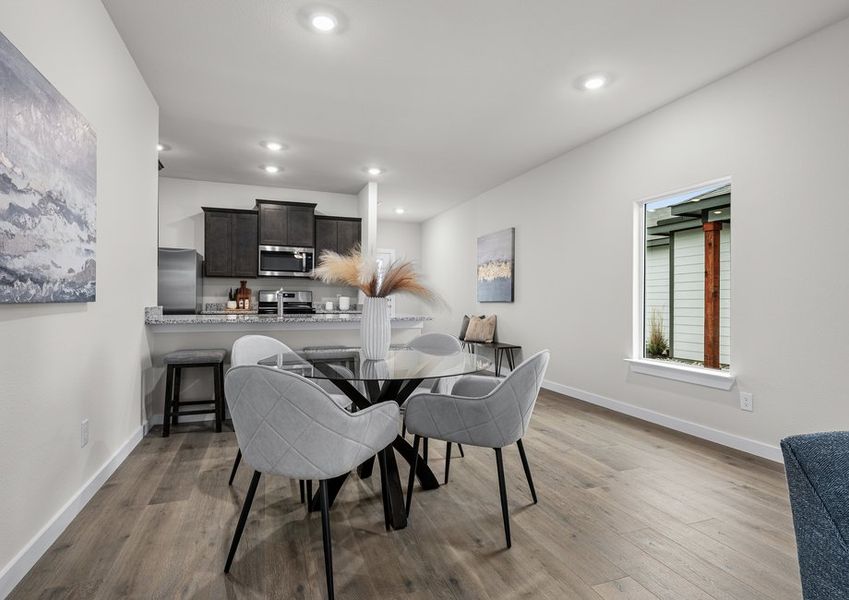 The dining room has a large window that lets in great, natural light. The dining room has a large window that lets in great, natural light.