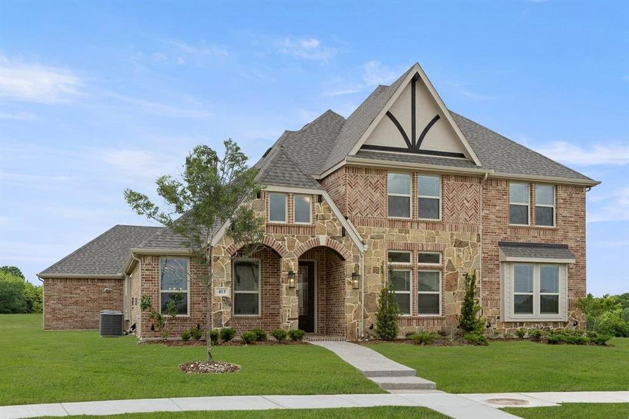 Front exterior of a new home in Summit Parks, DeSoto, TX, highlighting curb appeal (Image 21).