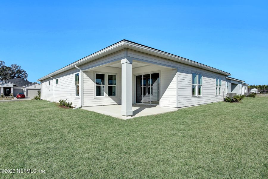 Exterior details and patio area of a home in , Flagler Beach (Image 3). Exterior details and patio area of a home in , Flagler Beach (Image 3).