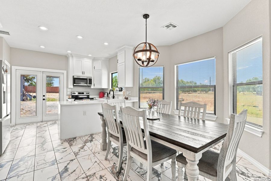 Furnished interior view inside a new home in , Von Ormy (Image 8).