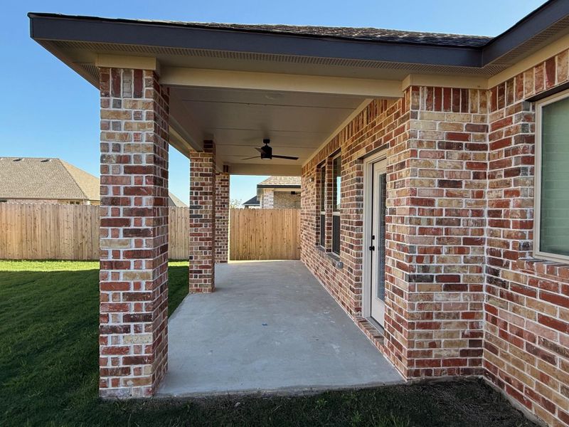 Exterior details and patio area of a home in Wellborn Settlement, College Station (Image 18).