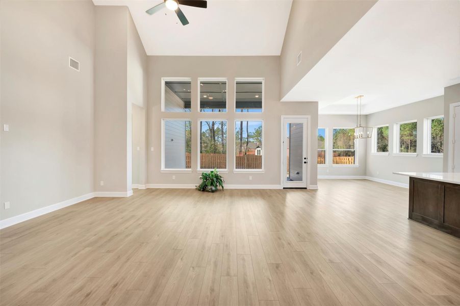 Low maintenance vinyl plank floors and lots of windows compliment this beautiful space!