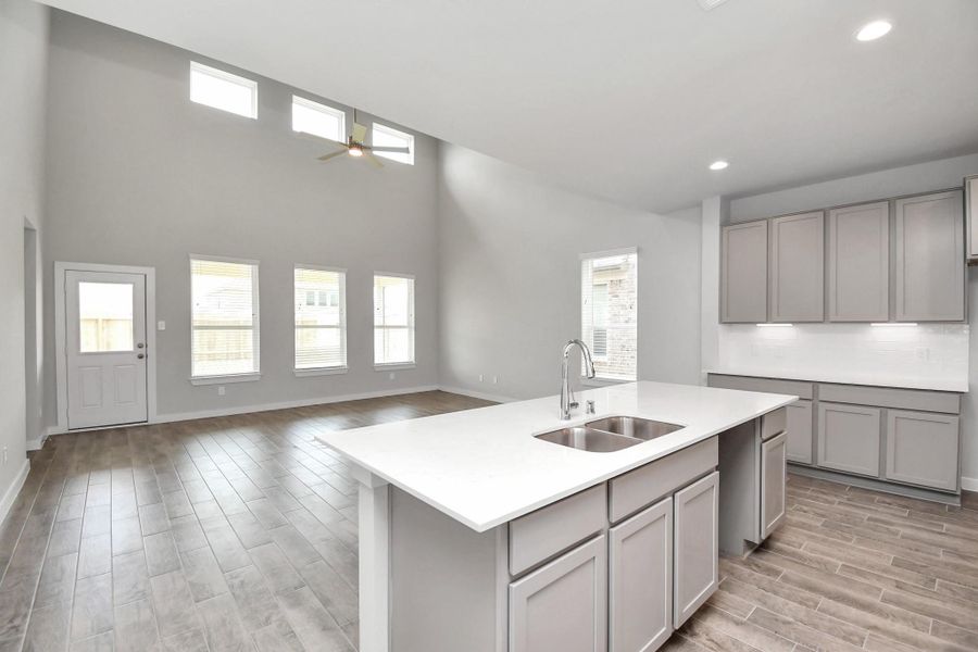 This generously spacious kitchen is a dream realized! Sample photo of completed home with similar floor plan. Actual colors and selections may vary.