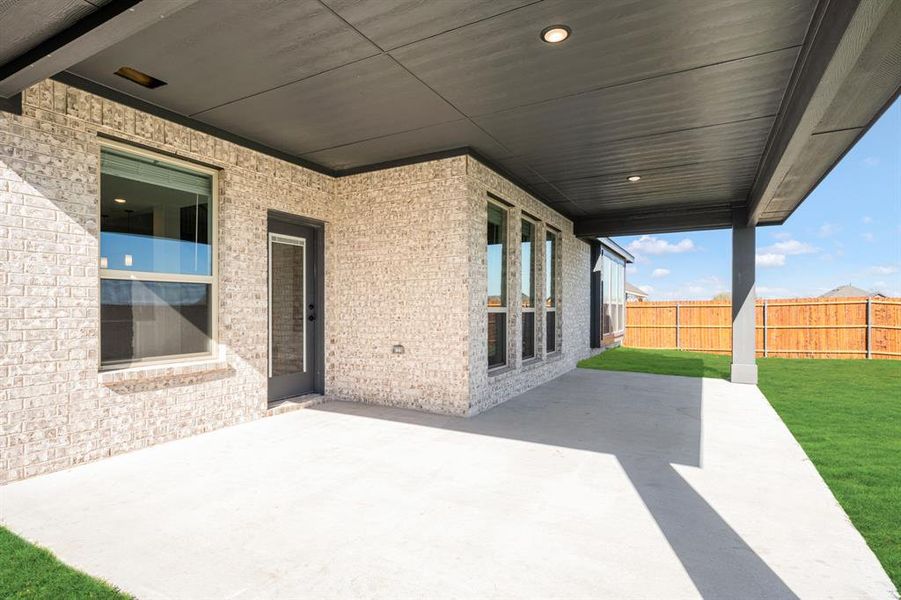 Exterior details and patio area of a home in The Oaks, Red Oak (Image 23). Exterior details and patio area of a home in The Oaks, Red Oak (Image 23).
