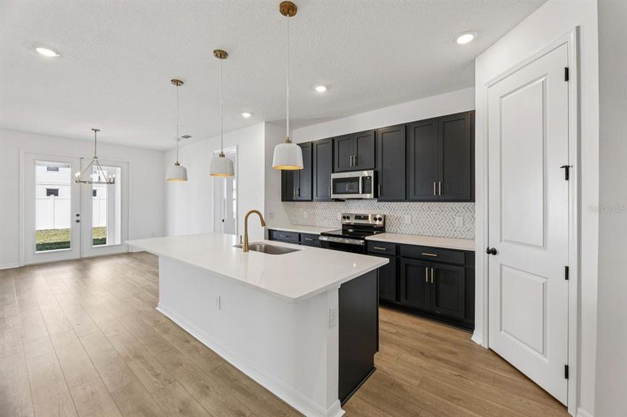 Furnished interior view inside a new home in Sunbrooke, St. Cloud (Image 7). Furnished interior view inside a new home in Sunbrooke, St. Cloud (Image 7).