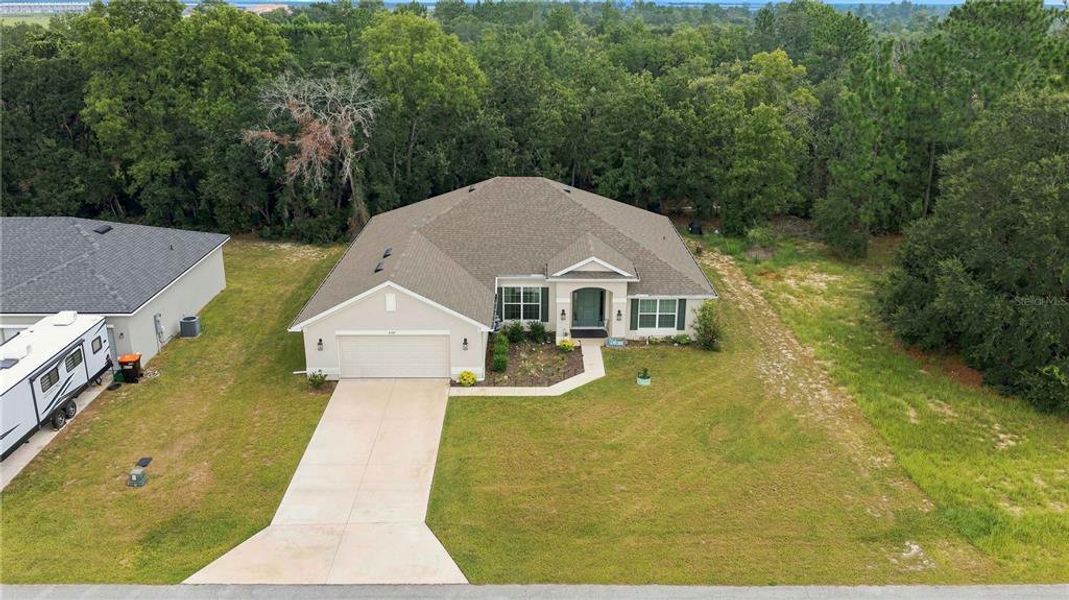 Front exterior of a new home in , Ocala, FL, highlighting curb appeal (Image 20). Front exterior of a new home in , Ocala, FL, highlighting curb appeal (Image 20).