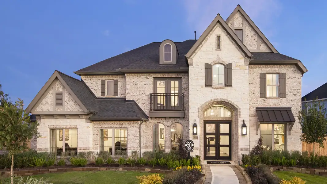 Front exterior of a new home in Candela, Richmond, TX, highlighting curb appeal (Image 21).