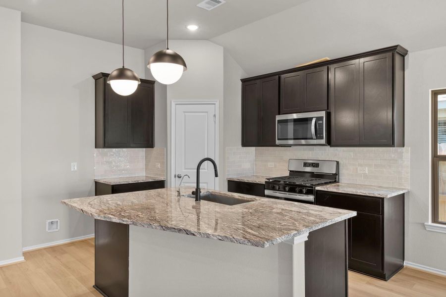 Furnished interior view inside a new home in Grand Central Park, Conroe (Image 10).