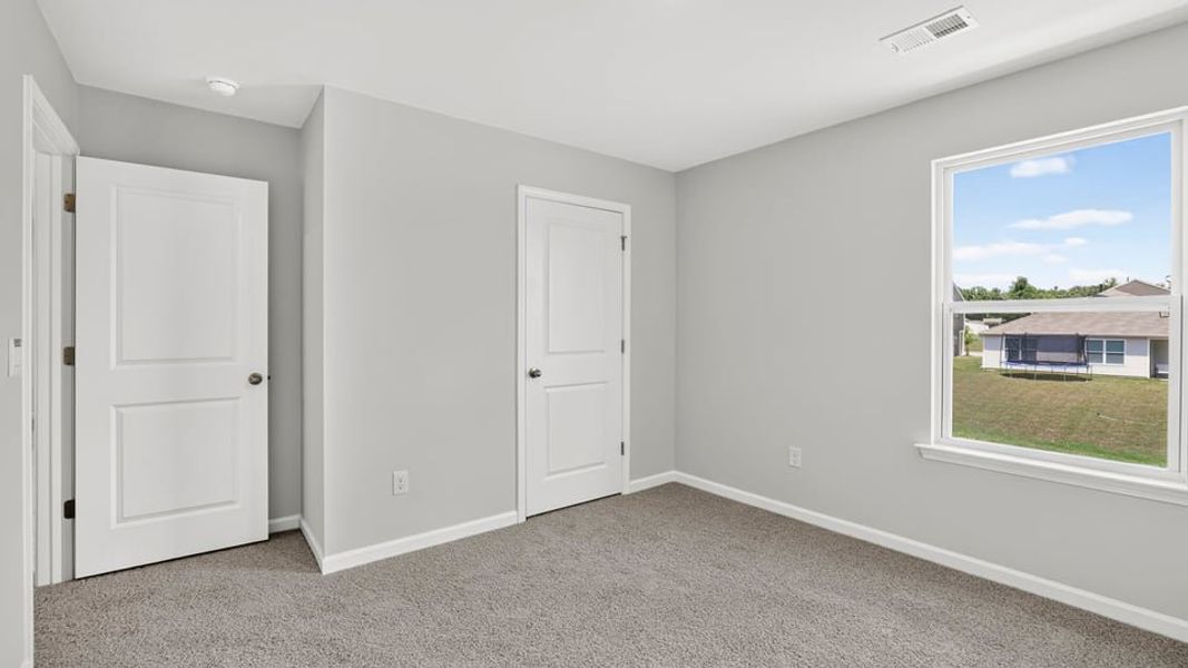 Spacious, unfurnished interior of a new home in Bentley Park, Greenwood (Image 28). Spacious, unfurnished interior of a new home in Bentley Park, Greenwood (Image 28).
