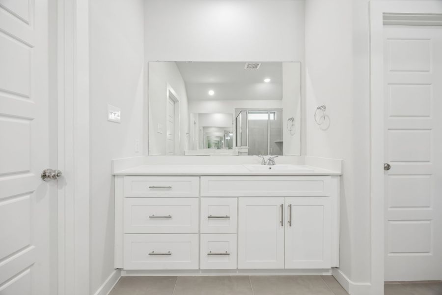 Primary bathroom in the Heisman home plan by Trophy Signature Homes – REPRESENTATIVE PHOTO Primary bathroom in the Heisman home plan by Trophy Signature Homes – REPRESENTATIVE PHOTO