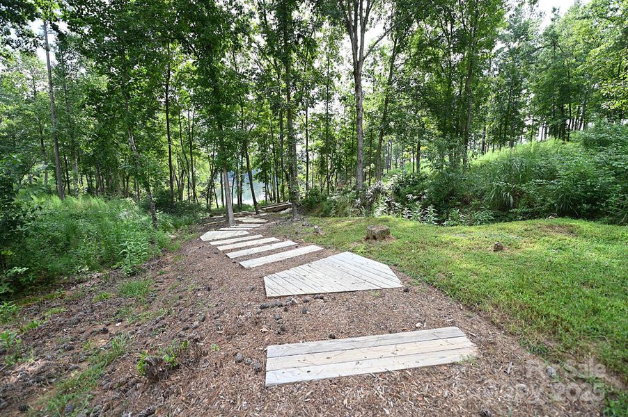 Front exterior of a new home in , Connelly Springs, NC, highlighting curb appeal (Image 18).