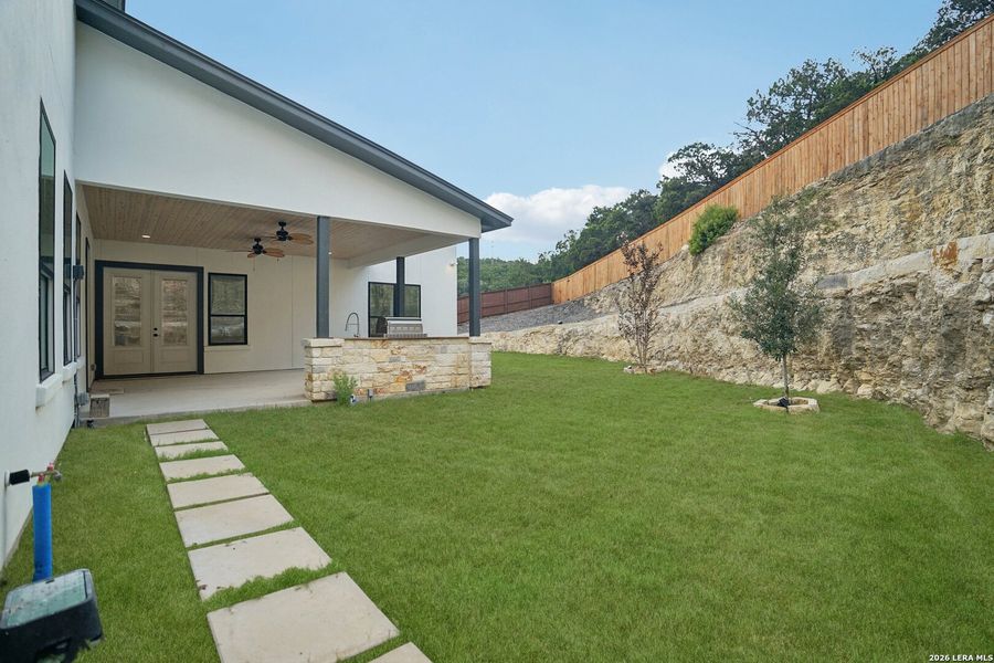 Exterior details and patio area of a home in , San Antonio (Image 33).