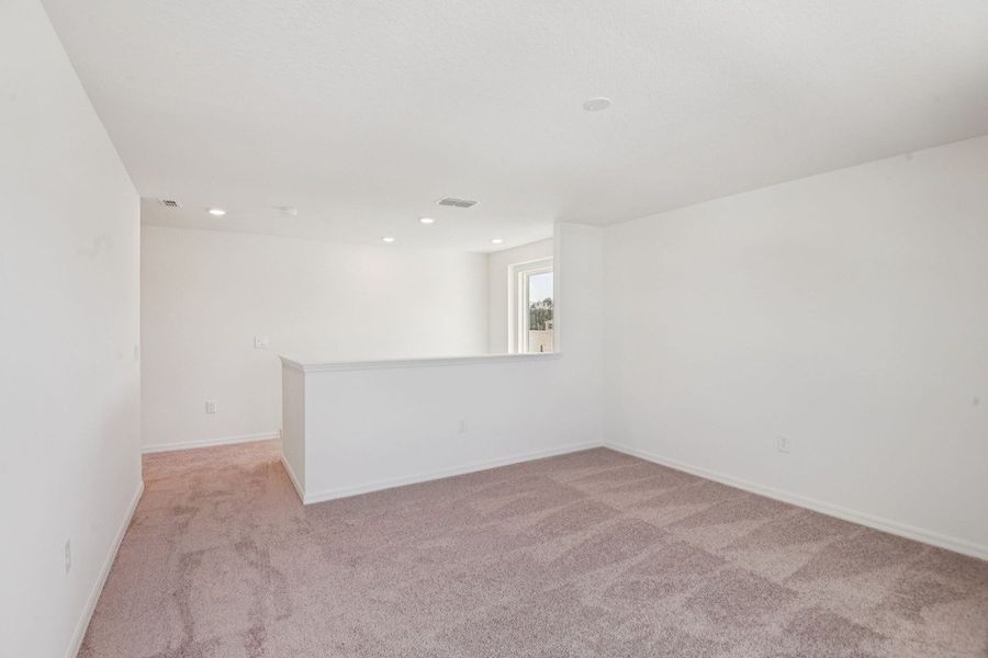 Spacious, unfurnished interior of a new home in The Preserve at Legends Pointe II, Hudson (Image 5).