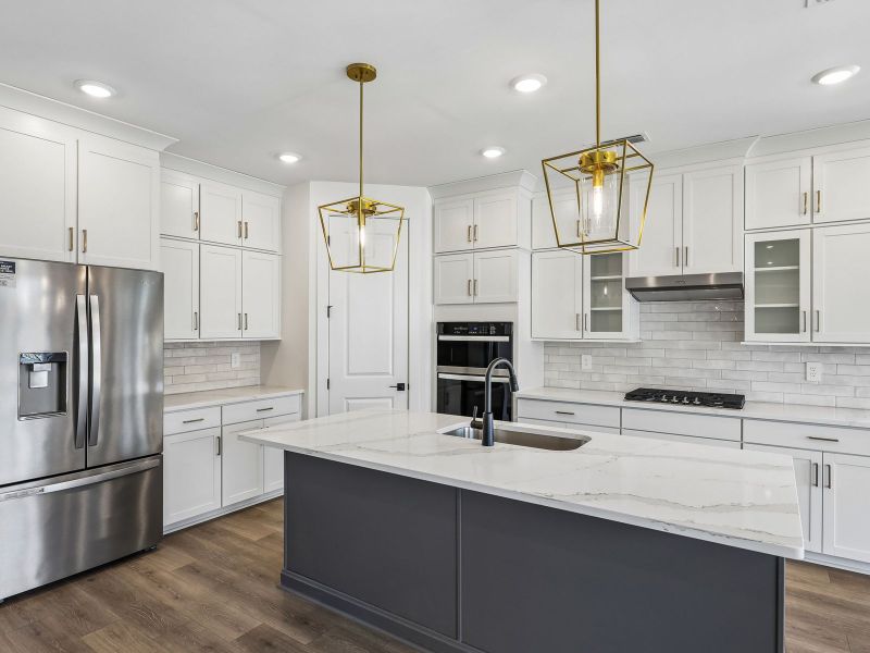Furnished interior view inside a new home in Station Hill - Estate Series, Franklin (Image 4).