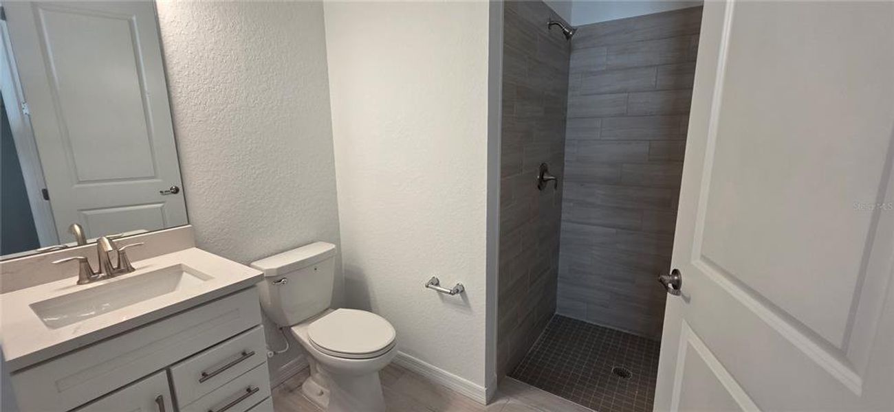 Furnished interior view inside a new home in Calusa Country Club, Lakewood Ranch (Image 6).