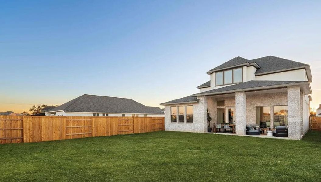 Exterior details and patio area of a home in 6 Creeks, Kyle (Image 2).