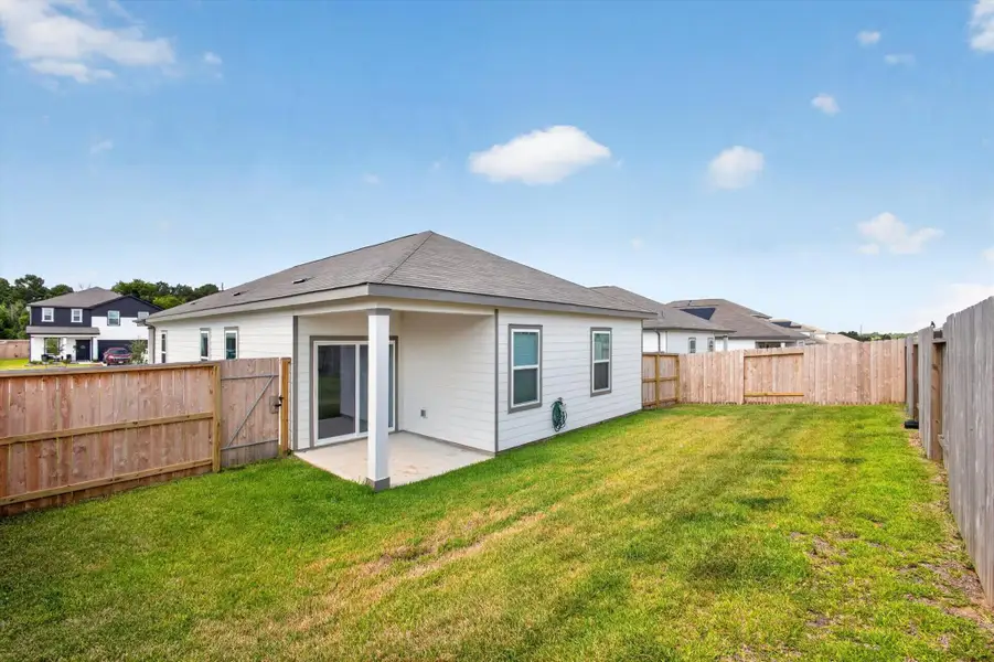 Exterior details and patio area of a home in , Waller (Image 4).