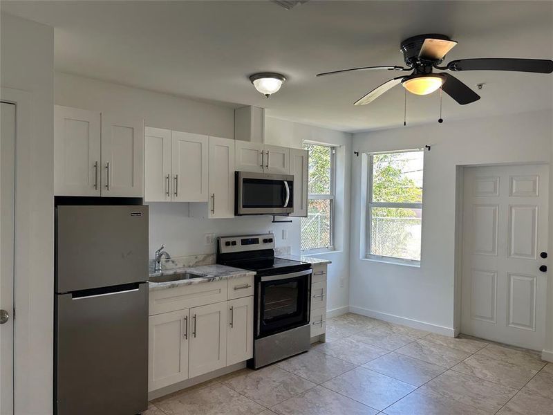 Furnished interior view inside a new home in , Fort Lauderdale (Image 3).