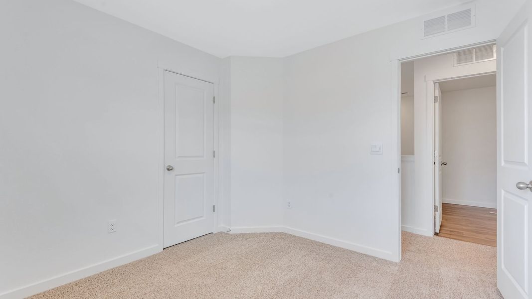 Representative unfurnished interior of a home built from the Juniper by D.R. Horton in Ellston Park, Colorado Springs (Image 34).