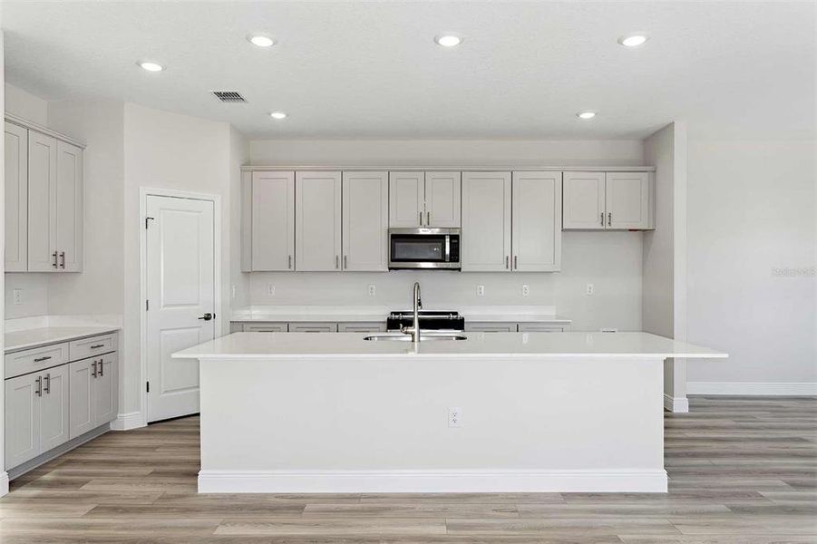 Furnished interior view inside a new home in Pasadena Woods, Dade City (Image 5). Furnished interior view inside a new home in Pasadena Woods, Dade City (Image 5).