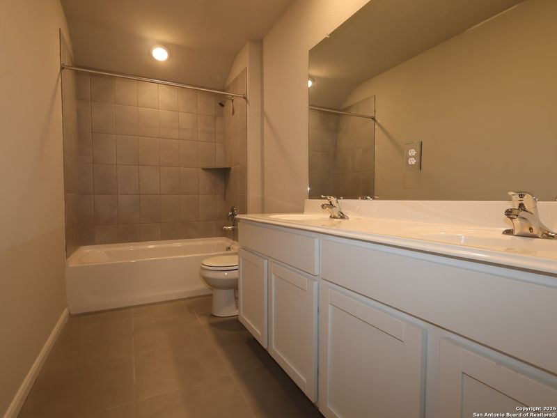 Furnished interior view inside a new home in Winding Brook, San Antonio (Image 11).