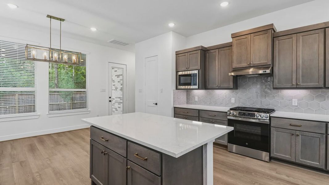 Furnished interior view inside a new home in The Woodland Hills 50', Willis (Image 6). Furnished interior view inside a new home in The Woodland Hills 50', Willis (Image 6).
