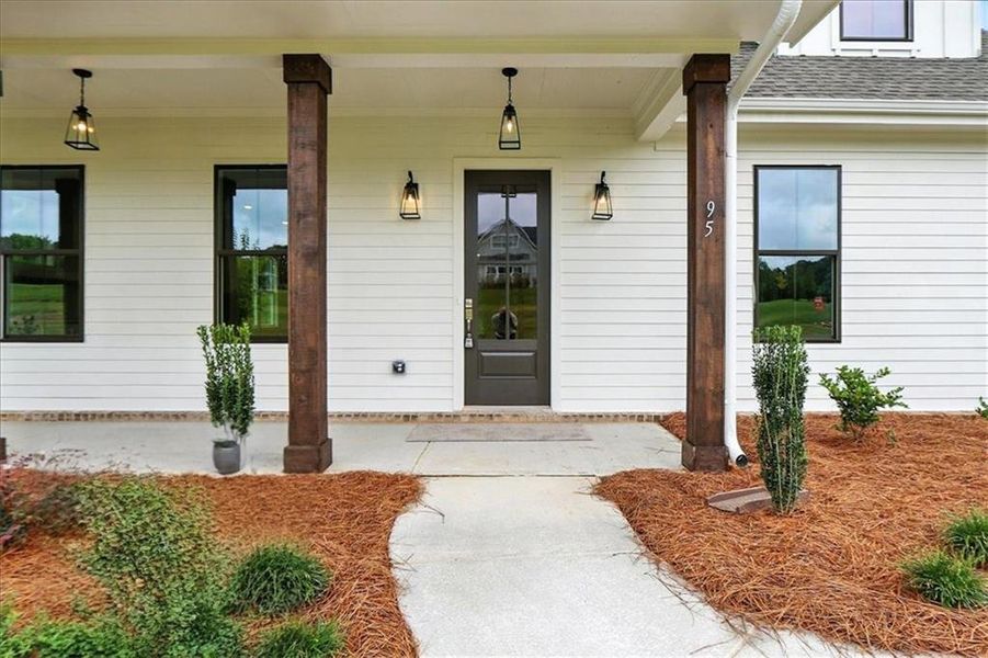 Exterior details and patio area of a home in Old Town Estates, Dacula (Image 39).