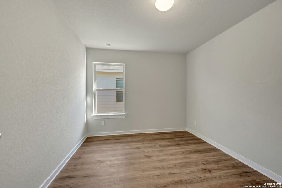 Spacious, unfurnished interior of a new home in Winding Brook, San Antonio (Image 13).