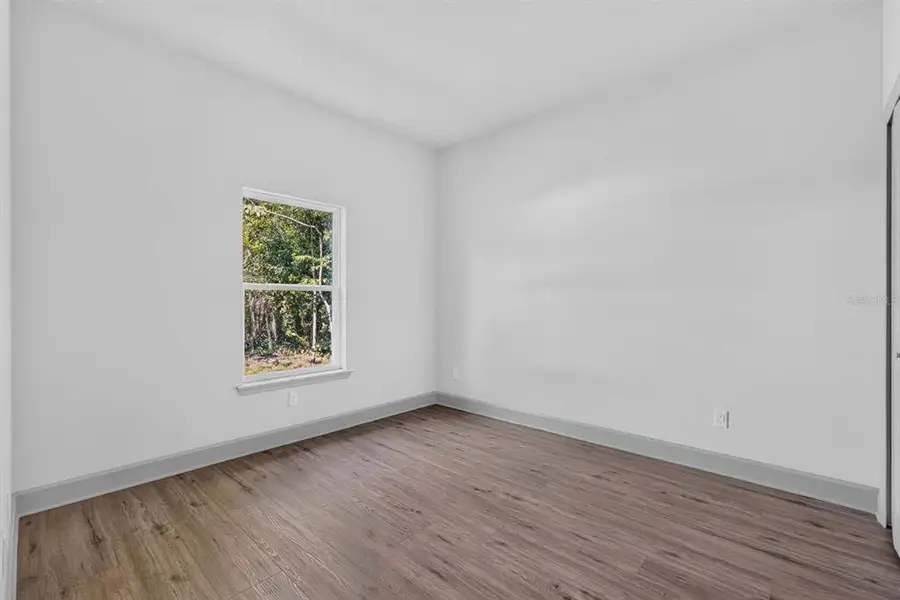 Spacious, unfurnished interior of a new home in , New Smyrna Beach (Image 34).