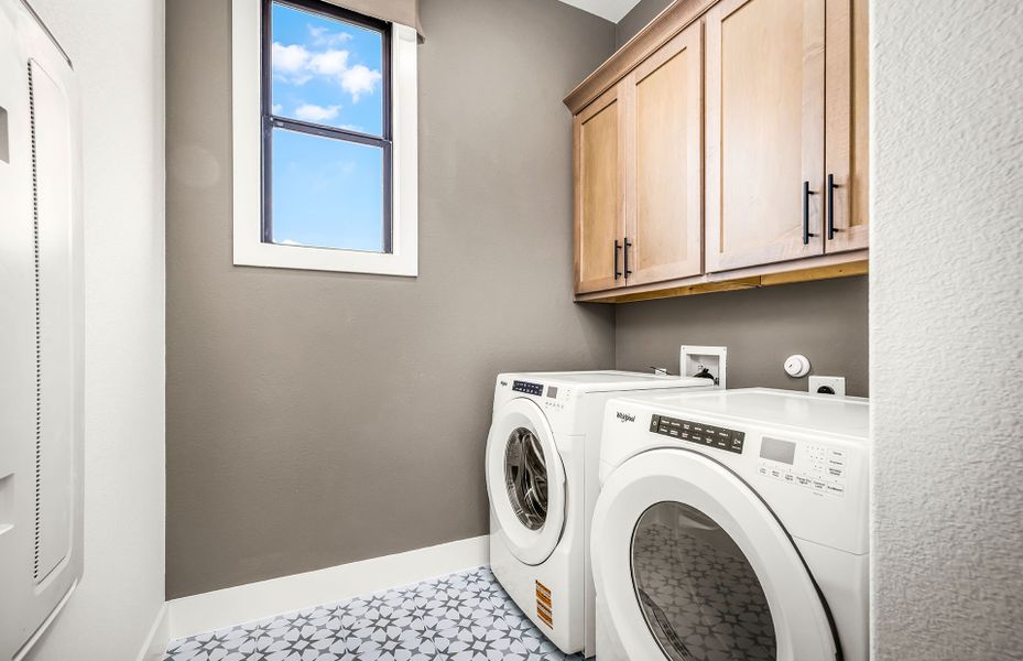 Spacious Laundry Room with Cabinet Storage Spacious Laundry Room with Cabinet Storage