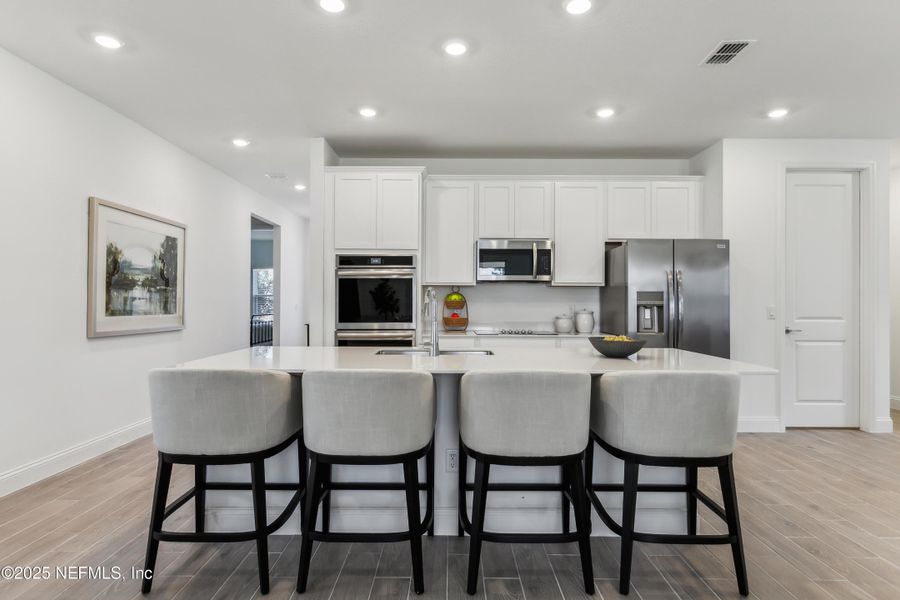 Furnished interior view inside a new home in Edenbrooke at Hyland Trail | 55+: Edenbrooke at Hyland Trail 60s, Green Cove Springs (Image 13).