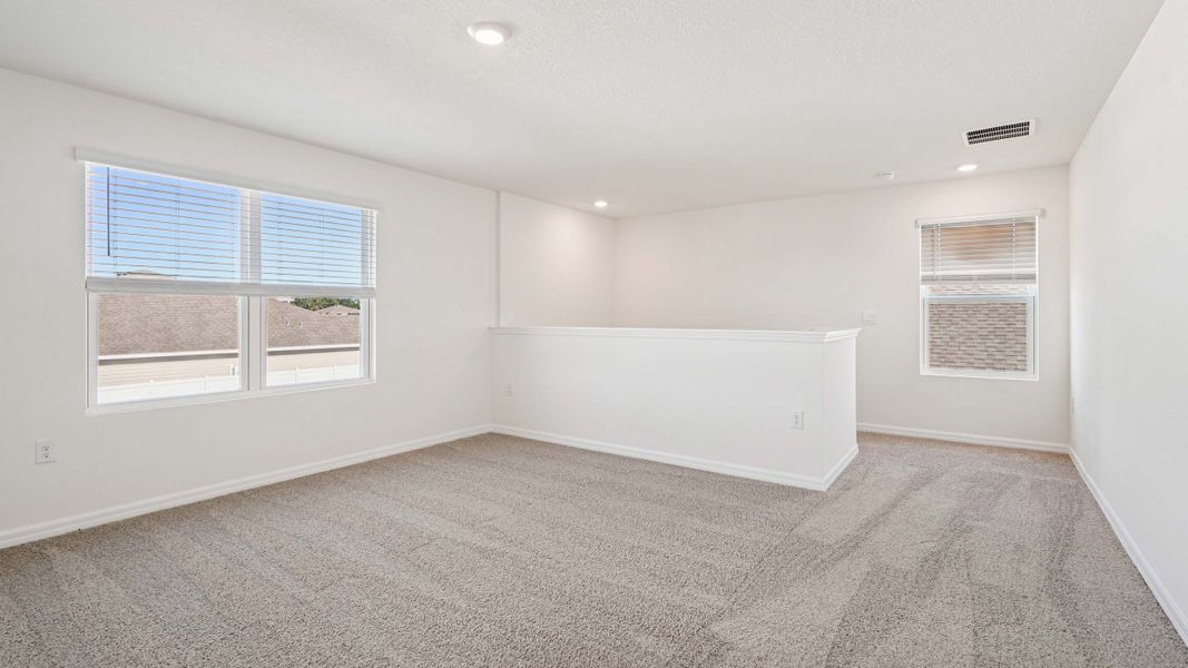 Representative unfurnished interior of a home built from the Ensley by D.R. Horton in Sandal Key, Weeki Wachee (Image 23).