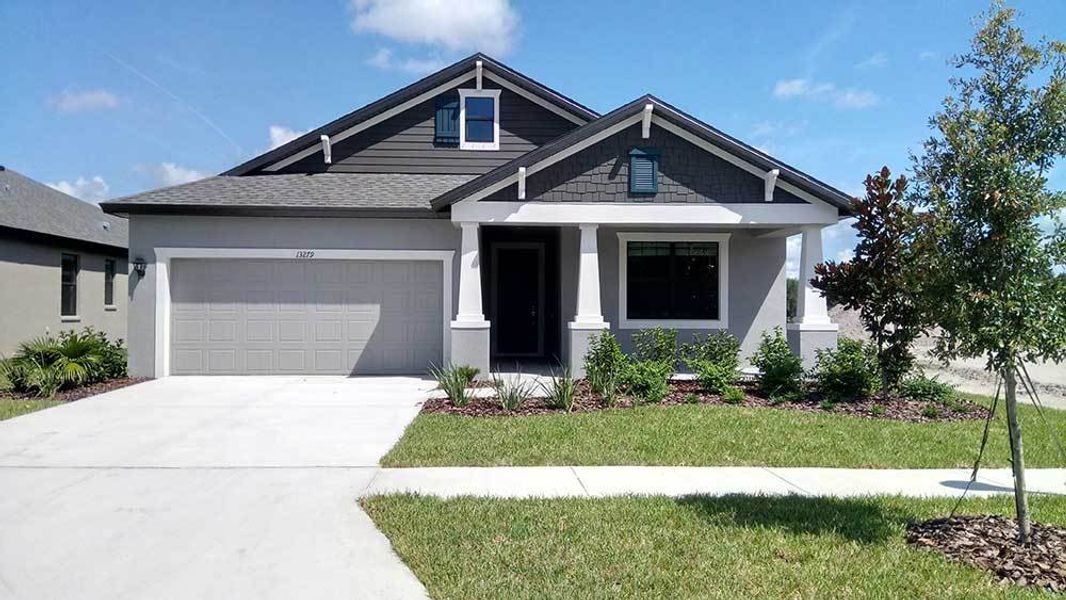 Representative exterior photo of a completed home built from the Sweetwater by William Ryan Homes in Myers Estates, Seffner, FL (Image 22).